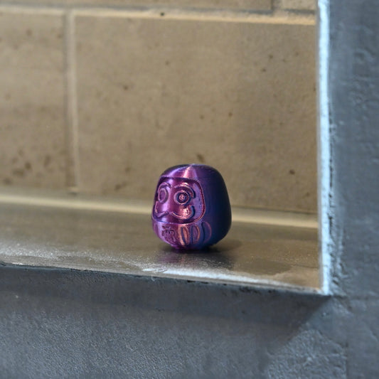 Den Daruma (電)